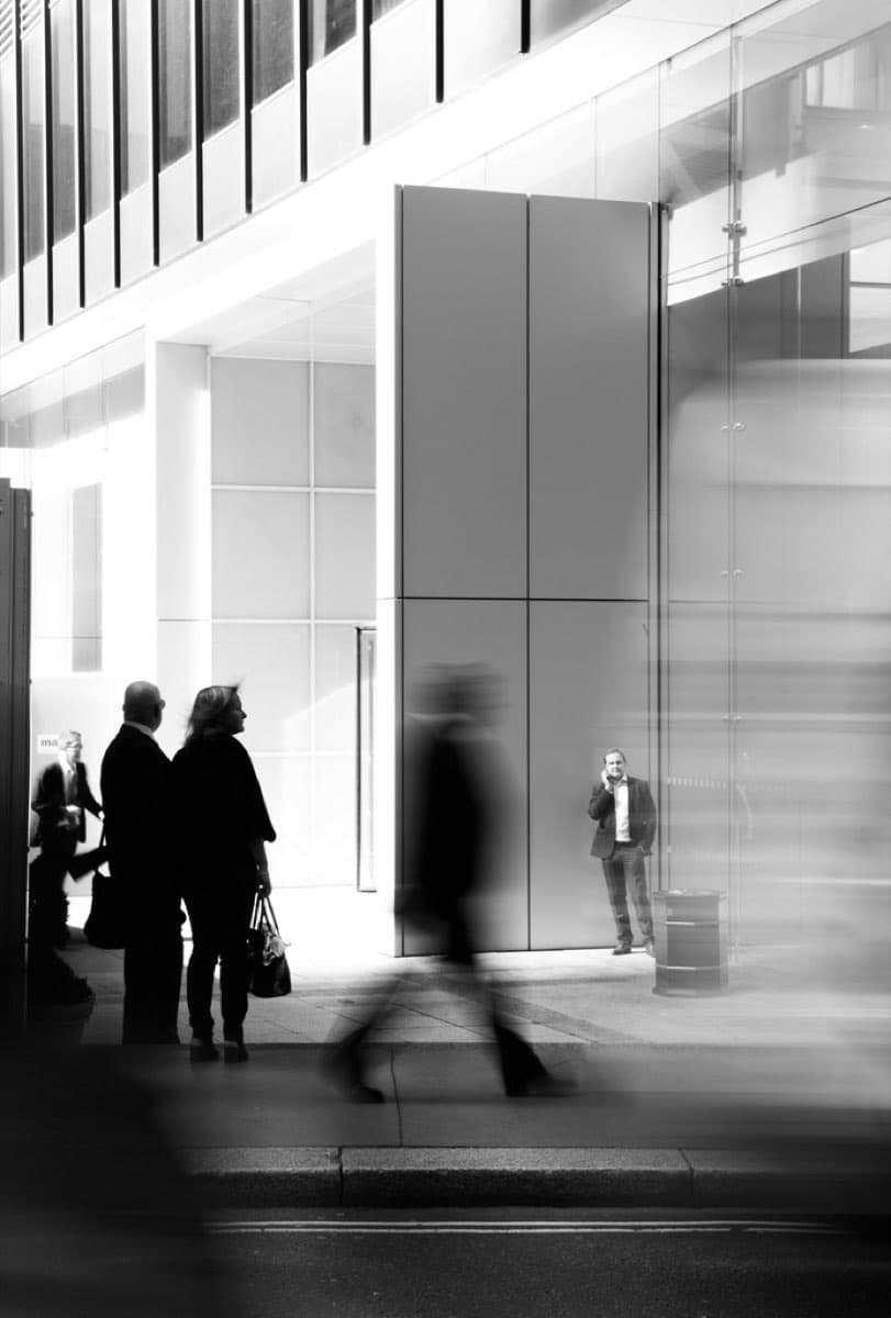 People walking towards building